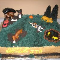 Jt's 3Rd Birthday Cake This was a cake that I did for my Godson's 3rd birthday...he had a dog theme. He seemed to really enjoy it, so I was happy! :)