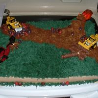 Construction Site Cake My cousin asked me to do a "truck" cake for my Godson's 2nd birthday. Since I've never done a theme cake before, I...