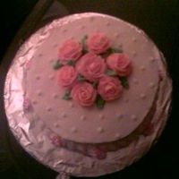 Roses.jpg This was decorated during class...where we were practicing our rose making skills! :)