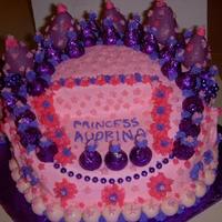 Princess Crown Cake This is a 10" triple stacked cake cut and shaped into a crown. The crown points are large strawberries dipped in purple chocolate and...