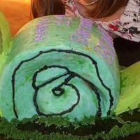 3D Snail Cake This is 2- loaf pan sizd Fr. Van cakes for the head and danish pastry Cinnamon roll for the body and tail all covered in BC. I used green...