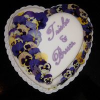 Pansy Wedding Top viewThis is my 3rd wedding cake. Its for my brother. I dried/pressed pansies for the decorations.