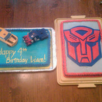 Transformers Cakes These were for my son's 4th Birthday party. He is a die hard Transformers fan. The autobot symbol is made from fondant and brushed...