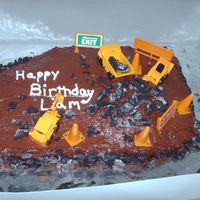 Construction Cake Chocolate cake with chocolate buttercream and crushed oreo's.