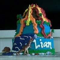 Dinosaur Birthday Cake My son is madly in love with Dinosaurs, so for his fifth birthday, my best friend and I made this cake for him. He loved it!