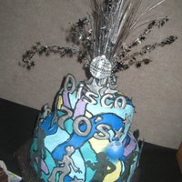 Disco 70's Blue Cake All buttercream iced, hardened royal icing lettering, shapes and dancer silouettes.