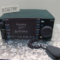 Ham Radio 3 - 1/4 sheet cakes stacked and covered in bc. Front panel, mic, and knobs, and call letters sign all made out of gumpaste.