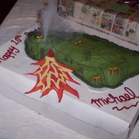 Dragon Birthday Cake Made this vanilla cake for my grandson. Smoke coming from dragon is dry ice in bowl, in box under cake. He was thrilled.