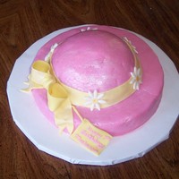 Tea Party Hat Made this for a young girls birthday party. The theme was tea party. Vanilla cake with mmf . First attempt at a hat.