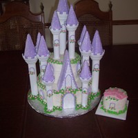 Birthday Castle Birthday cake for 1 year old using Wilton's castle. Lots of fun. Smash cake is 4" round. All cake is french vanilla with bc icing...