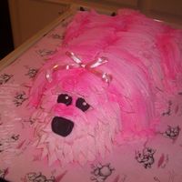 Meri's Puppy Cake My daughter loves pink, puppies, and princesses! buttercream puppy "spray-painted" pink w/ fondant nose and eyes.