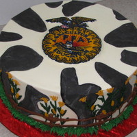 Ffa Party Iced and decorated with BC, except for the Satin Ice cow patches. The emblem is a FBCT. Done for my niece who works with FFA school groups...