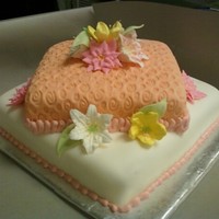 10 Year Old Bedazzling Birthday 2 tiered 6 inch and 10 inch White Square Cake. Both covered w/ Raspberry Lemon Buttercream then w/ Fondant. All flowers were fondant as...