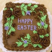 Chocolate_Easter.jpg This is a yellow cake with chocolate frosting and flowers.
