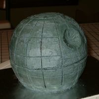 Death Star My futur brother-in-law asked me to make a cake to look like the Death Star from Star Wars for his grooms cake. This is my first practice...
