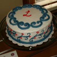 "l" Cake This is a cake I made for my sister's wedding shower. The L on the cake is for her first name. I used a pattern press for the...