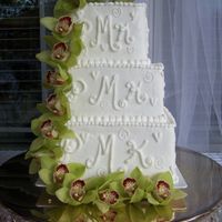 Karen & Peter's Wedding 1st tier - Mocha cake with mocha filling; 2nd tier - dark chocolate cake with bavarian cream; 3rd tier - Standard white cake with mango...