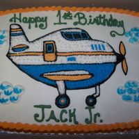 Soaring Into Your 1St Birthday Little boy loves airplanes so that's what he got on his birthday cake. White cake with bavarian cream and fresh strawberries for the...