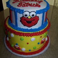Patrick's Elmo Cake 8 and 6 inch rounds. Patrick loves Elmo so that is what he got!White cake with strawberry and marble cake with chocolate creme! Sesame...