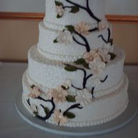 Vines And Flowers Lemon cake with lemon curd filling on all layers. Buttercream frosting, gumpaste flowers and leaves, chocolate fondant vines. The weather...