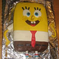 Sponge Bob Cake I made this cake for a little girls birthday. Covered with fondant. Legs are fondant covered pretzels. Thanks for looking!