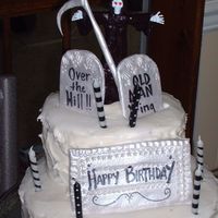 Kristies Dad Bday carrot cake with cream cheese frosting; sicle, skeleton & tombstones are gumpaste; cloak is mmf. i love this grim reaper.