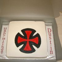 Independent Logo Cake This is a white/chocolate marble cake with cheesecake mousse filling. Buttercream icing with bct for logo and dot border on bottom. The bct...