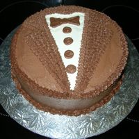 Tux Cake Chocolate cake decorated with butter cream icing