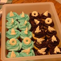 Christmas Cupcakes These are a set of cupcakes that I made for a holiday work party. The tops were made from using white chocolate and molds.