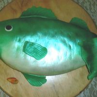 Bass Groom's Cake 9x13 cake carved into fish shape, decorated with fondant and luster dust.