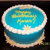 Birthday Cake Buttercream with Gumpaste daisies.