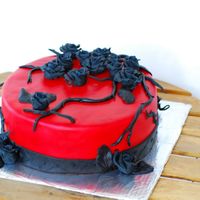 Gothicstyle a friend asked me to make a gohticcake for her daughter, so i came up with this. The roses and roots are made of fondant and the cake is...
