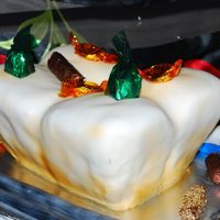 Tooth i had to make this cake for a dentist. The tools and the brush is made with fondant, this is my first carved cake.