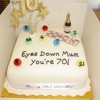 Bingo Cake 6" square cake covered and decorated with sugarpaste. '70' spray is made from wired sugarpaste dusted with gold. Made for a...