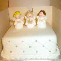 Three Angels Christmas Cake 6" fruit cake covered in marzipan and sugarpaste with sugarpaste models.