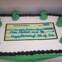 Check Birthday Cake Customer's family members work at a bank. Check is an edible image with buttercream writing. Dollar signs are edible images attached...