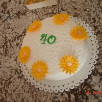 Gerbera,flowers made a birthday cake,filles with buttercream and rasberries
