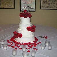 Roses And Dahlias This is a 12", 10", 8", 6" round wedding cake, decorated in white buttercream with dots and fresh flowers for...