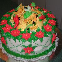Feliz Navidad Cake I made this 10" round cake for a feliz navidad party. Nachos were my inspiration. I then decided to make RI poinsettias to make it a...