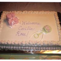 Marshmallow Booties Baby shower cake for my younger sister. Buttercream icing with marshmallows put together for the booties and another for the top of the...