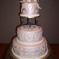 Ivory Scroll Cake 14", 10", and 6" covered in MMF and RI detail.