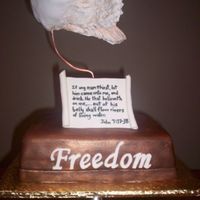 Freedom Sculpture Cake made to look like sculpture (Freedom, Journey of Grace). Angel wings made with wire frame covered with MMF, painted with royal and...