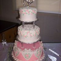 Round Wedding Cake White chocolate cake with meringue buttercream covered and decorated with cream cheese flavored MMF.