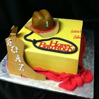 First Birthday Iced in buttercream with fondant rope bandana and letters, gumpaste boots and hat rim