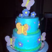 Butterfly Birthday The butterflies and flowers are out of fondant and royal icing, the cake frosted with BC.
