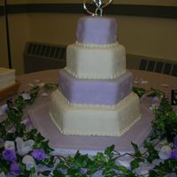 Hexagon Purple And White I like this cake as it was simple and pretty. Purple & white marshmallow fondant with royal icing hearts.