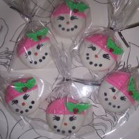 119846338068701.jpg Second try at sugarshack's adorable snowmen cookies, for family xmas party. I liked these one's more with the hot pink!
