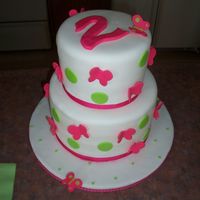 Dovey's Butterfly Cake all fondant. made to match invitations i made for my daughter's 2nd bday. the 2 broke, tried to repair and ended up, my only choice...