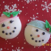 245.jpg Here is a better pic, I think the flash was washing the faces out. Choc. covered cookies from "how to" thread. Too cute, had to...