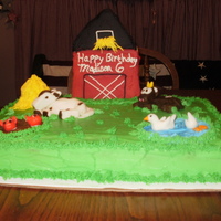 Barnyard Barnyard cake iced with buttercream, barn is a sugar cookie iced in buttercream animals, mud and pond are made of MMF. Haystack is a mound...